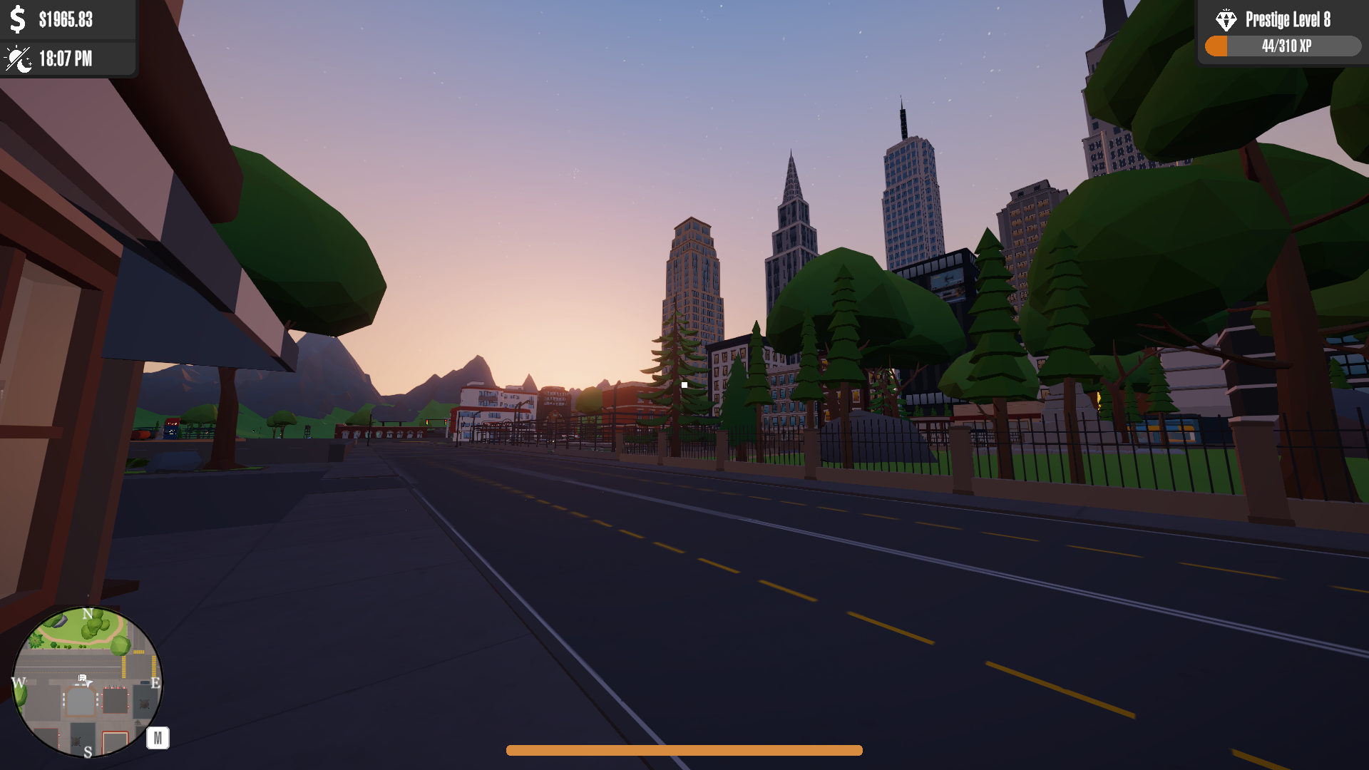The city at dusk, its skyline lit against the setting sun.